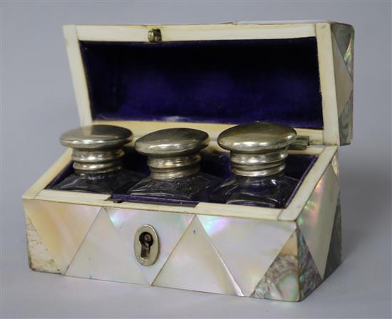 A Victorian mother of pearl cased set of three scent bottles 10.5cm